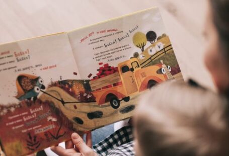 Puppetry Storytelling - Woman Reading Book to Toddler