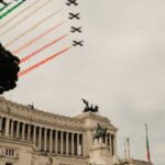 National Day Of Italy - Air show above Victor Emmanuel Monument with sculptures in city