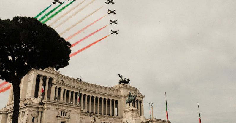 National Day Of Italy - Air show above Victor Emmanuel Monument with sculptures in city