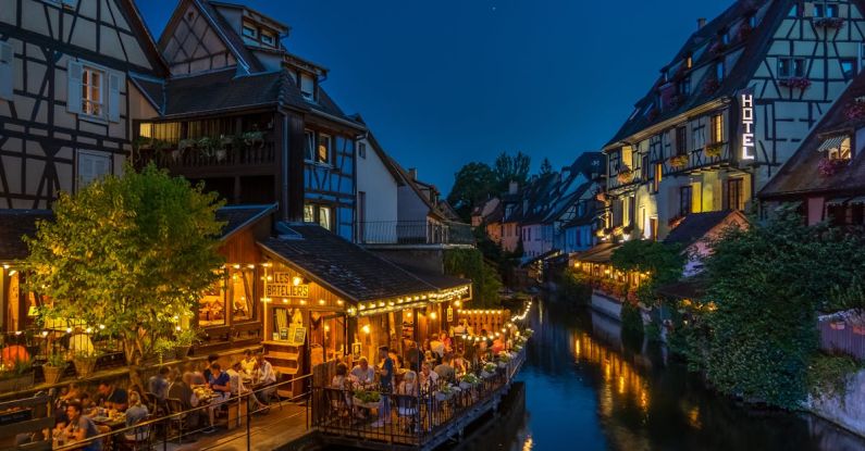 Late-Night Dining - Photography of Buildings and Canal during Nighttime