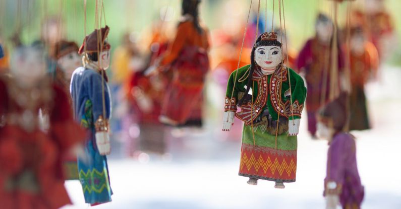 Culinary Souvenirs - Traditional Handmade Puppets Hanging on Strings